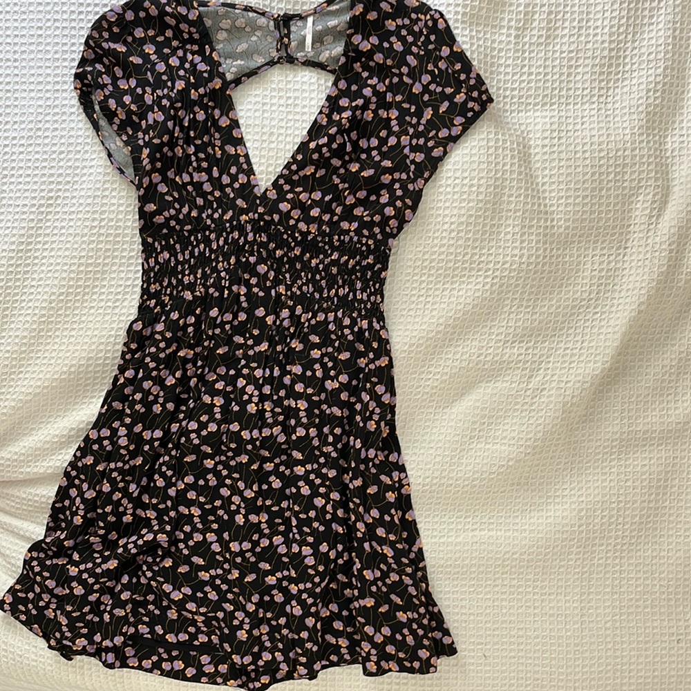 Free People black dress with floral print. Size S